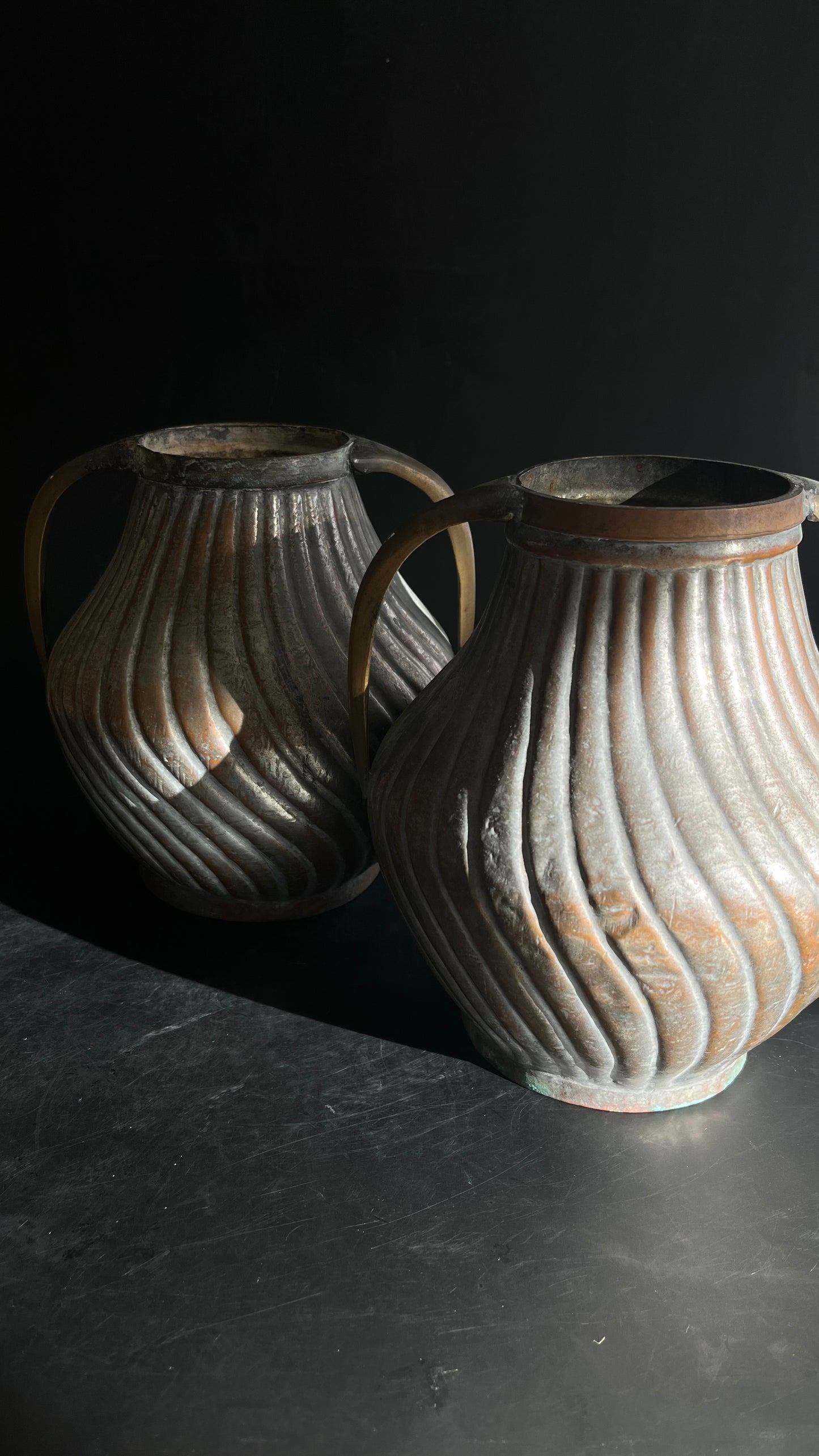 Pair of Ribbed Metal Urn Vases with Patina & Brass Handle