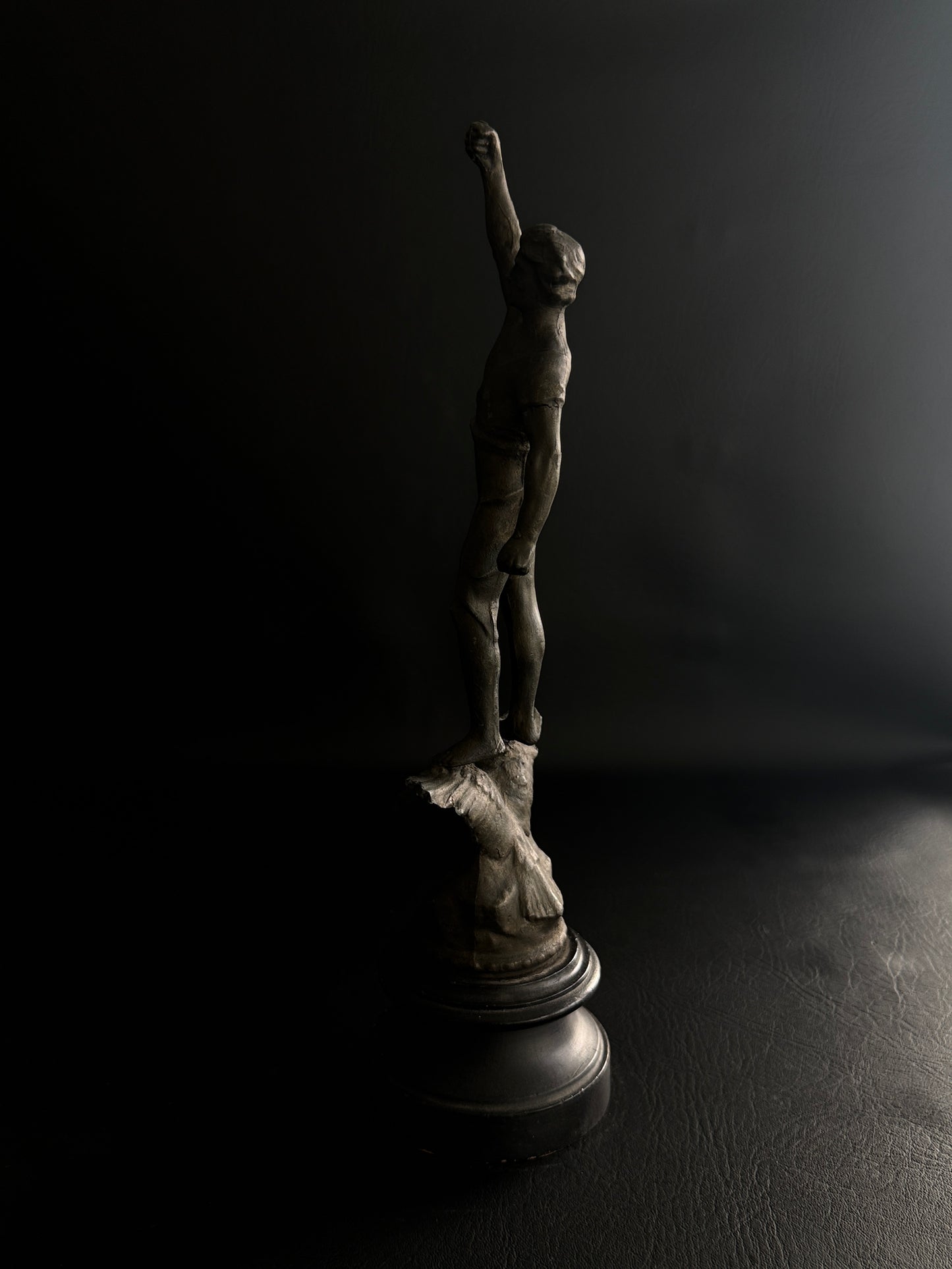 Antique Figural Metal Sculpture of Man Standing on Eagle with Wood Base