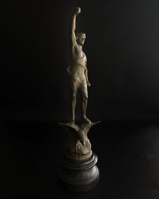 Antique Figural Metal Sculpture of Man Standing on Eagle with Wood Base