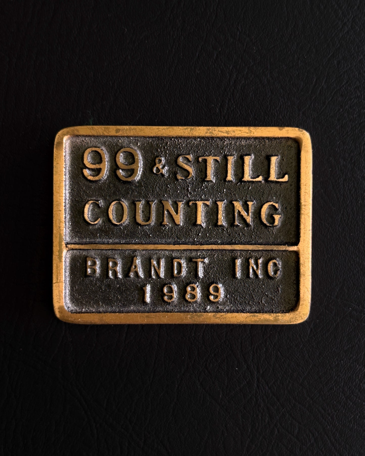“99 & Still Counting – Brandt Inc 1989” Metal Plaque / Paper Weight