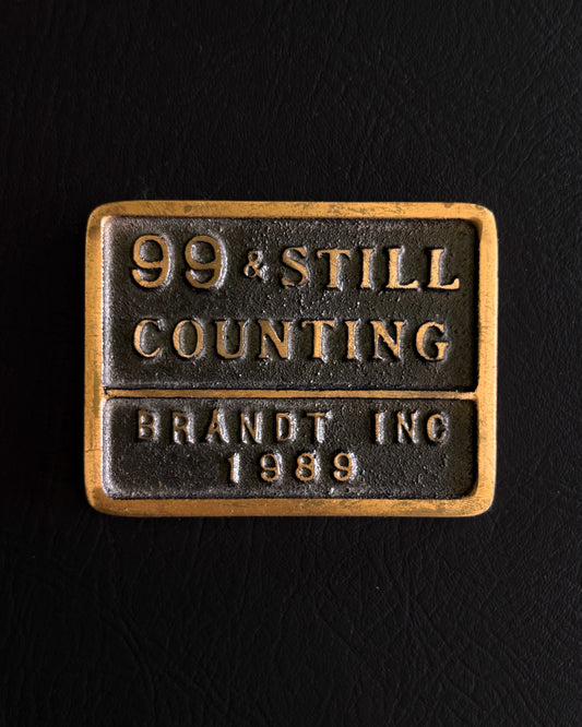 “99 & Still Counting – Brandt Inc 1989” Metal Plaque / Paper Weight